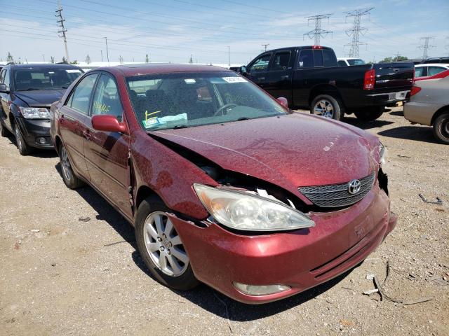 4T1BF30KX3U040122 - 2003 TOYOTA CAMRY LE RED photo 1