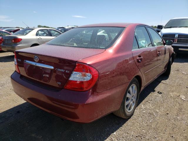 4T1BF30KX3U040122 - 2003 TOYOTA CAMRY LE RED photo 4