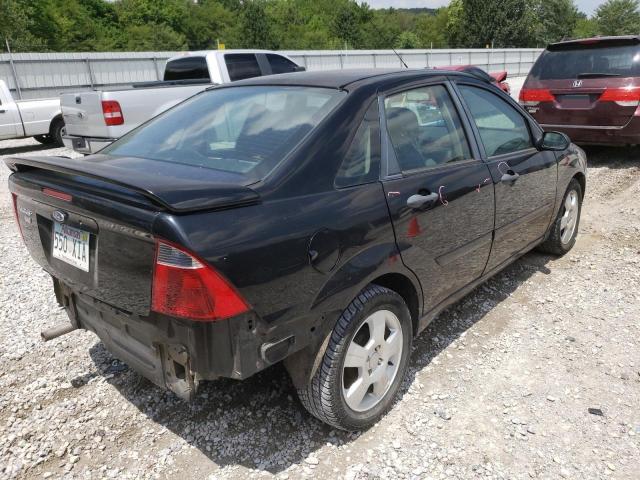 1FAHP34NX7W361674 - 2007 FORD FOCUS ZX4 BLACK photo 4