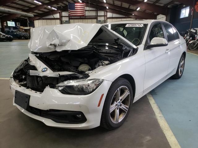 WBA8E5G31HNU44243 - 2017 BMW 320 XI WHITE photo 2
