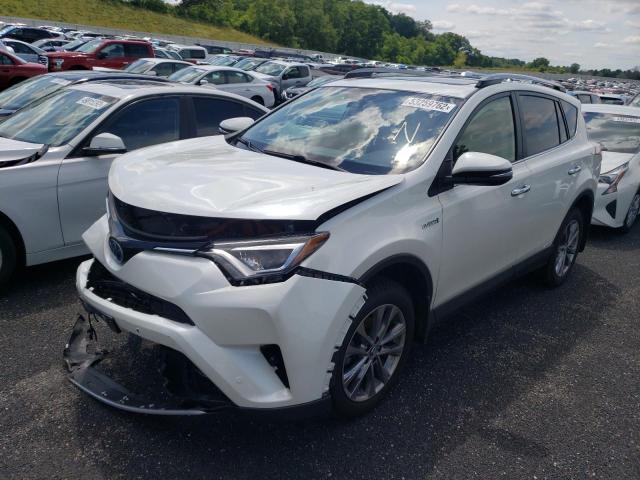 JTMDJREV9HD104434 - 2017 TOYOTA RAV4 HV LI WHITE photo 2