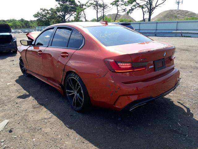 3MW5U9J00N8C24635 - 2022 BMW M340XI ORANGE photo 3