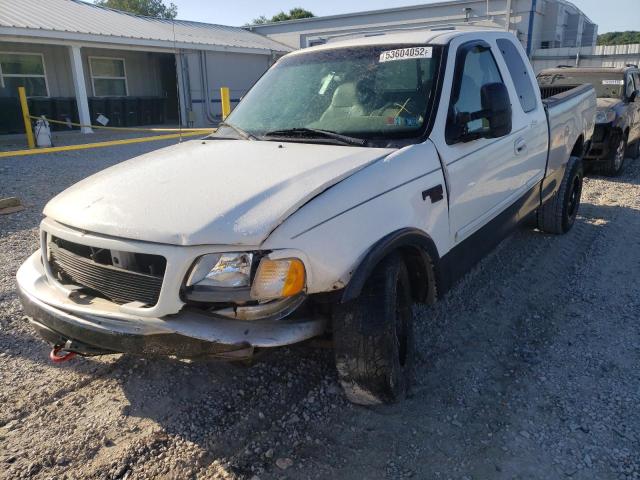 1FTRX18LXYNA80705 - 2000 FORD F150 WHITE photo 2