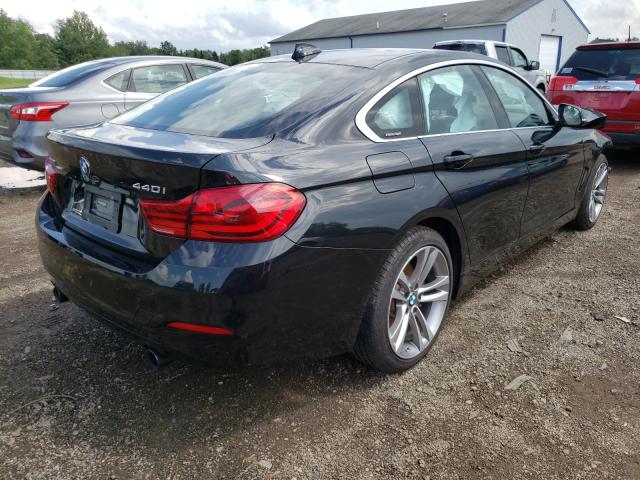 WBA4J7C50KBM76073 - 2019 BMW 440XI GRAN BLACK photo 4