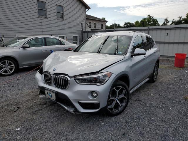 WBXHT3Z38H4A54147 - 2017 BMW X1 XDRIVE2 SILVER photo 2