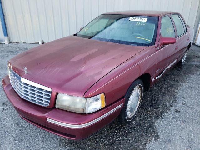 1G6KD54Y8XU718928 - 1999 CADILLAC DEVILLE RED photo 2