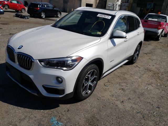 WBXHT3C37H5F74424 - 2017 BMW X1 XDRIVE2 WHITE photo 2