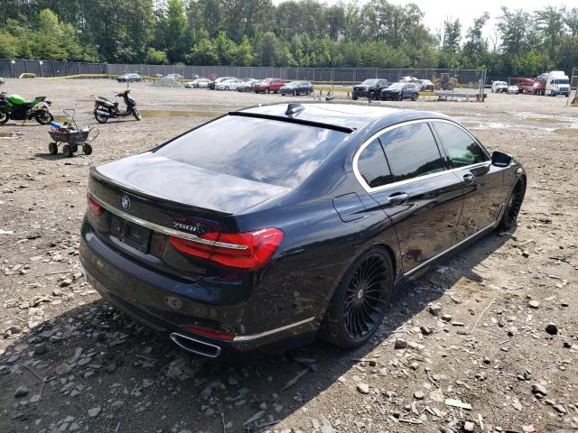 WBA7F2C58GG418742 - 2016 BMW 750 XI BLACK photo 4