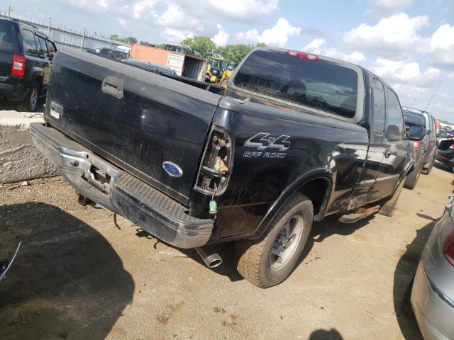 2FTRX18L4XCA63628 - 1999 FORD F-150 BLACK photo 4