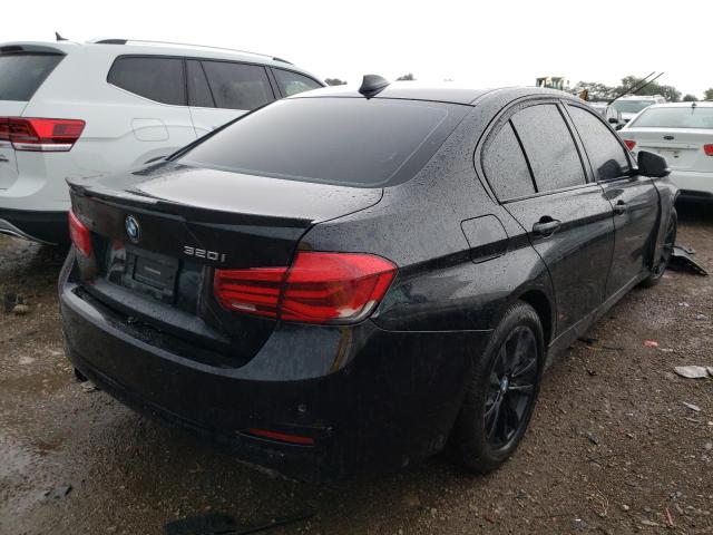 WBA8E5G59HNU23027 - 2017 BMW 320 XI BLACK photo 4