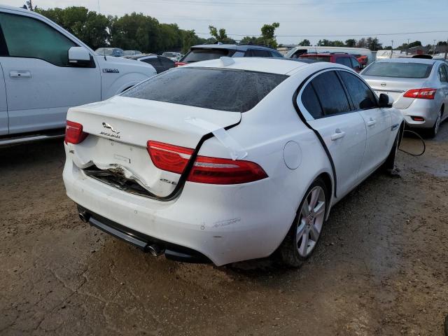 SAJAD4BG1HA957738 - 2017 JAGUAR XE PREMIUM WHITE photo 4