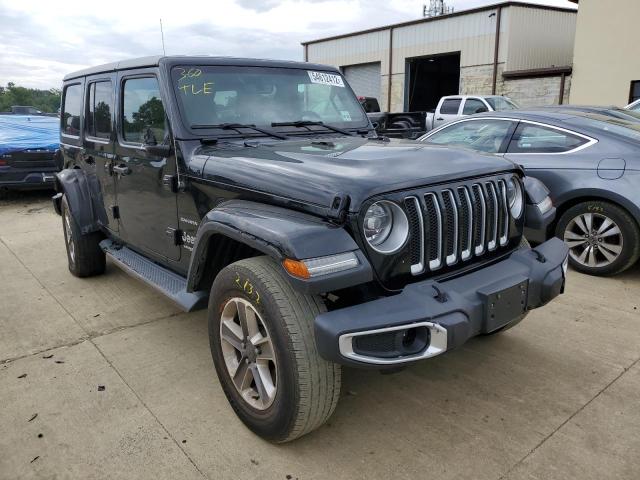 1C4HJXEN6JW278512 - 2018 JEEP WRANGLER U BLACK photo 1