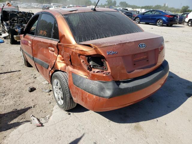 KNADE223696457246 - 2009 KIA RIO BASE ORANGE photo 3