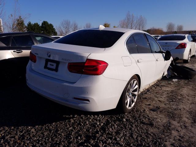 WBA8E5G55HNU41315 - 2017 BMW 320 XI WHITE photo 4