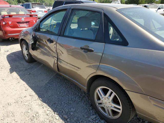 1FAFP34323W103973 - 2003 FORD FOCUS SE C TAN photo 10