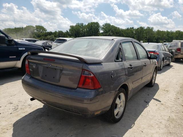 1FAHP34N27W227340 - 2007 FORD FOCUS ZX4 GRAY photo 4