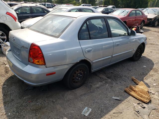 KMHCG45CX5U652820 - 2005 HYUNDAI ACCENT BLUE photo 4