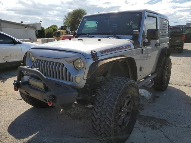 1C4AJWAG2GL156095 - 2016 JEEP WRANGLER S SILVER photo 2