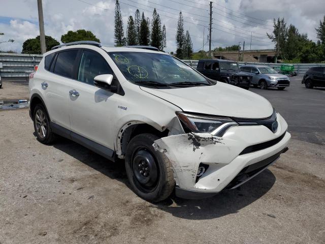 JTMDJREV1GD001443 - 2016 TOYOTA RAV4 HV LI WHITE photo 1