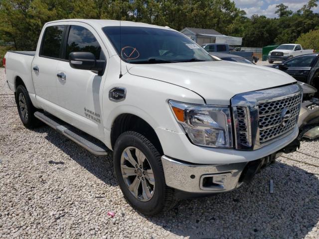 1N6AA1E64HN571121 - 2017 NISSAN TITAN SV WHITE photo 1