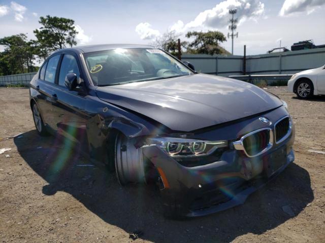 WBA8E5G51JNU47764 - 2018 BMW 320 XI GRAY photo 1