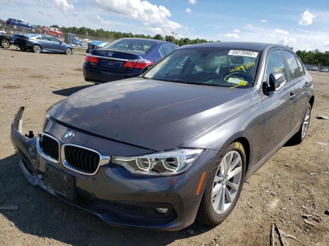 WBA8E5G51JNU47764 - 2018 BMW 320 XI GRAY photo 2