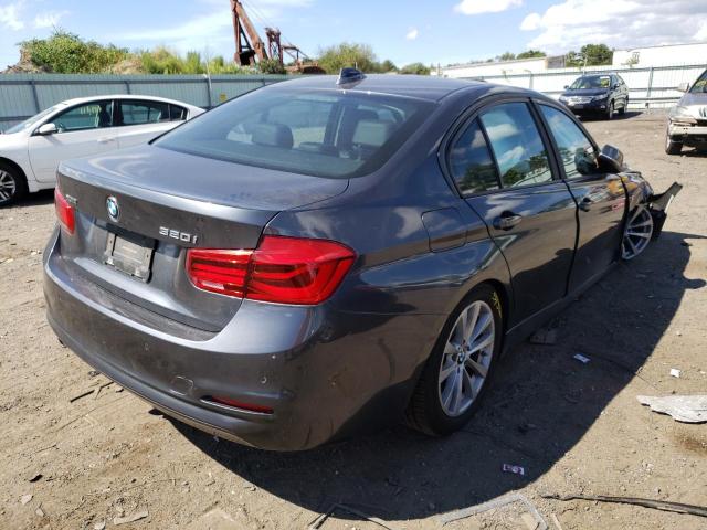 WBA8E5G51JNU47764 - 2018 BMW 320 XI GRAY photo 4