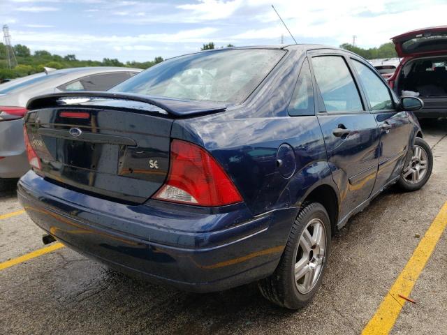 1FAFP34354W149251 - 2004 FORD FOCUS SE C BLUE photo 4