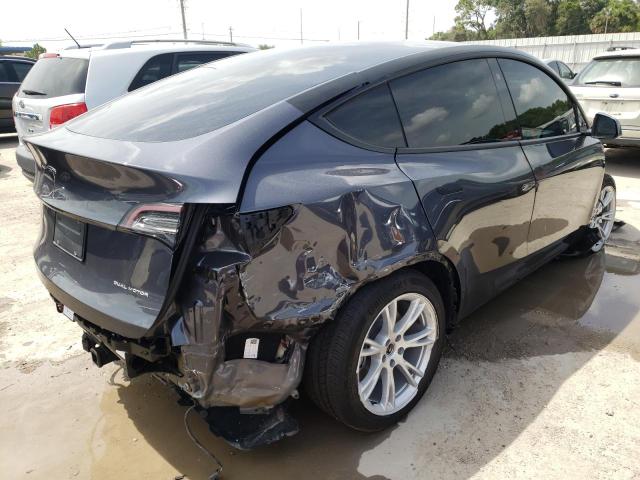 7SAYGAEE5NF381378 - 2022 TESLA MODEL Y Graphite photo 4