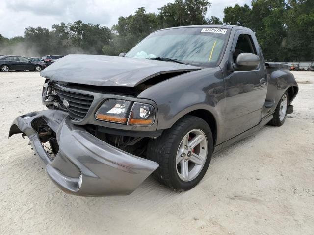 2FTRF07374CA25563 - 2004 FORD F150 SVT L CHARCOAL photo 2