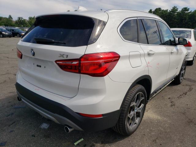 WBXHT3Z3XG4A50583 - 2016 BMW X1 XDRIVE2 WHITE photo 4