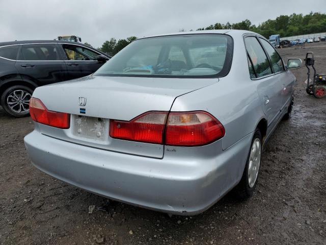 1HGCG6658YA099091 - 2000 HONDA ACCORD LX SILVER photo 4