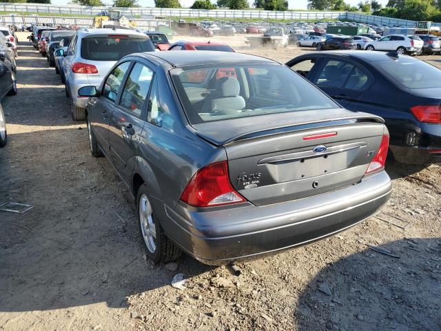 1FAFP38Z44W127272 - 2004 FORD FOCUS ZTS GRAY photo 3