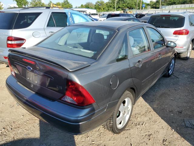 1FAFP38Z44W127272 - 2004 FORD FOCUS ZTS GRAY photo 4