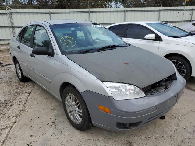 1FAFP34N85W228724 - 2005 FORD FOCUS ZX4 GRAY photo 1