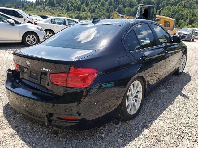 WBA8E5G55HNU22375 - 2017 BMW 320 XI BLACK photo 4