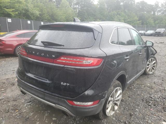5LMCJ2C91HUL17055 - 2017 LINCOLN MKC SELECT შავი ფოტო 4