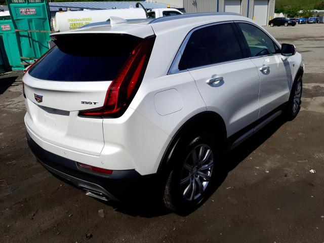 1GYFZDR40PF100405 - 2023 CADILLAC XT4 PREMIU WHITE photo 4