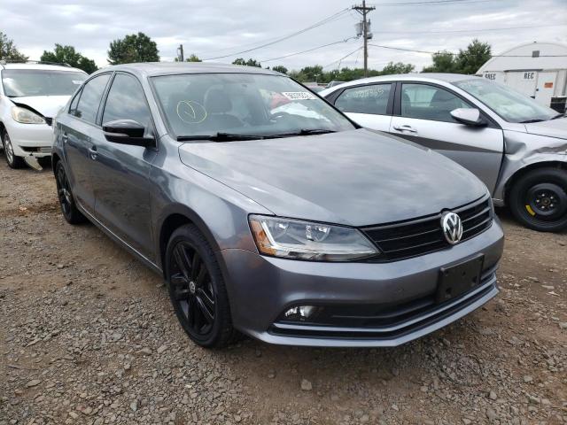 3VWD17AJXJM254261 - 2018 VOLKSWAGEN JETTA SPOR GRAY photo 1