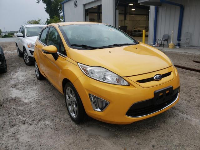 3FADP4FJ0BM124764 - 2011 FORD FIESTA SES GOLD photo 1