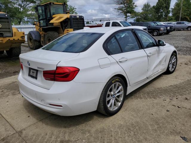 WBA8E5G31HNU44663 - 2017 BMW 320 XI WHITE photo 4