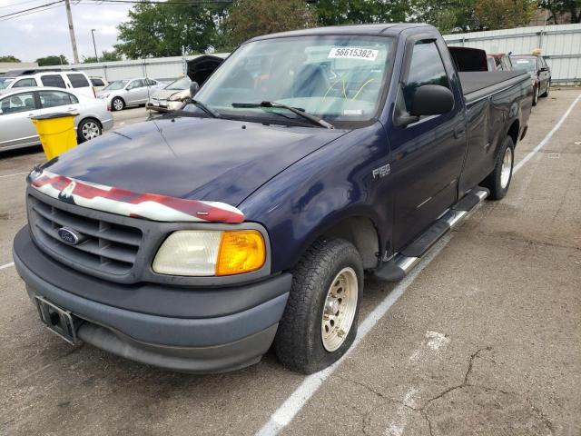 2FTRF17204CA97928 - 2004 FORD F-150 HERI BLUE photo 2