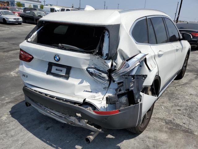 WBXHT3C31J5L28651 - 2018 BMW X1 XDRIVE2 WHITE photo 9