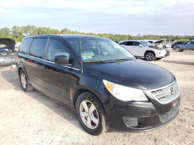 2V4RW3D1XAR242592 - 2010 VOLKSWAGEN ROUTAN SE BLACK photo 1