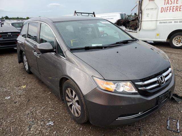 5FNRL5H32GB021731 - 2016 HONDA ODYSSEY SE GRAY photo 1