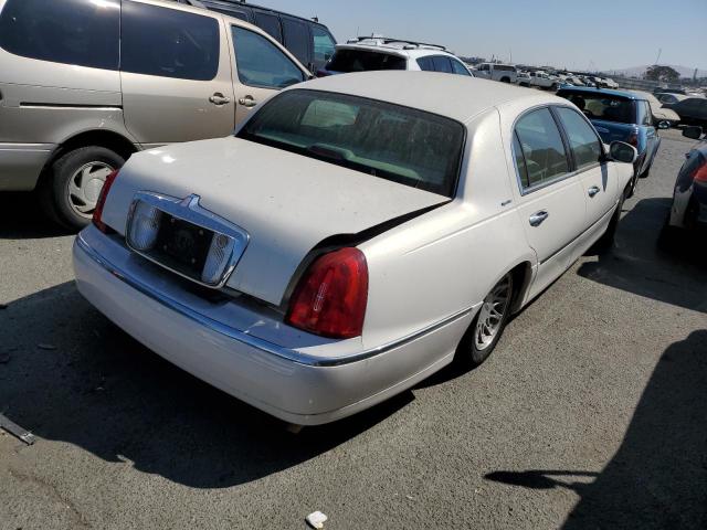 1LNHM82W1XY650373 - 1999 LINCOLN TOWN CAR S WHITE photo 4