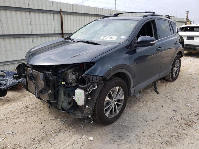 JTMRJREV3JD170697 - 2018 TOYOTA RAV4 HV LE BLUE photo 2