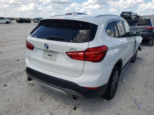 WBXHT3C38H5F85559 - 2017 BMW X1 XDRIVE2 WHITE photo 4