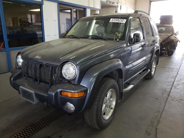 1J8GL58K32W298450 - 2002 JEEP LIBERTY BLUE photo 2