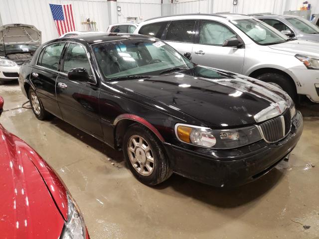 1LNHM82W0YY859962 - 2000 LINCOLN TOWN CAR S BLACK photo 4